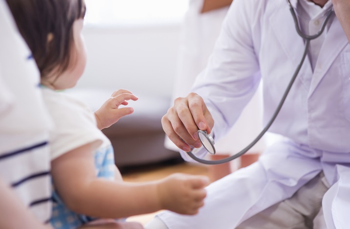 The doctor examine the child and nurse